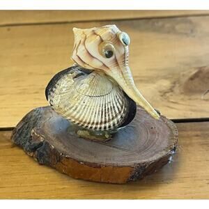 Vintage Novelty Knick-Knack. Bird made out of sea shells on wood. Beach Nautical